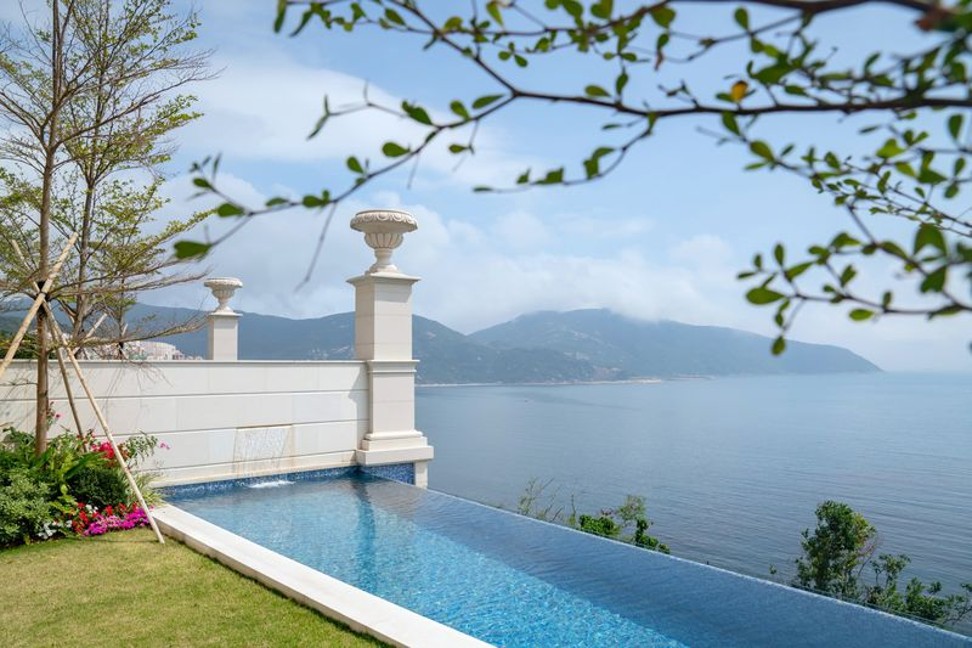 Each one of the seven properties in the luxury Tai Tam development has its own infinity pool and landscaped gardens. Photo: Bloomberg