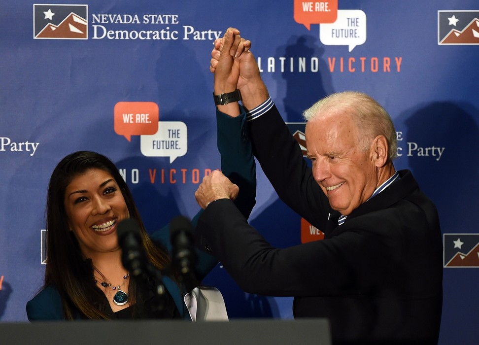 Then-Democratic candidate for lieutenant governor and Nevada Assemblywoman Lucy Flores, left, introduces then US Vice-President Joe Biden at a get-out-the-vote rally in 2014 in Las Vegas. Photo: TNS