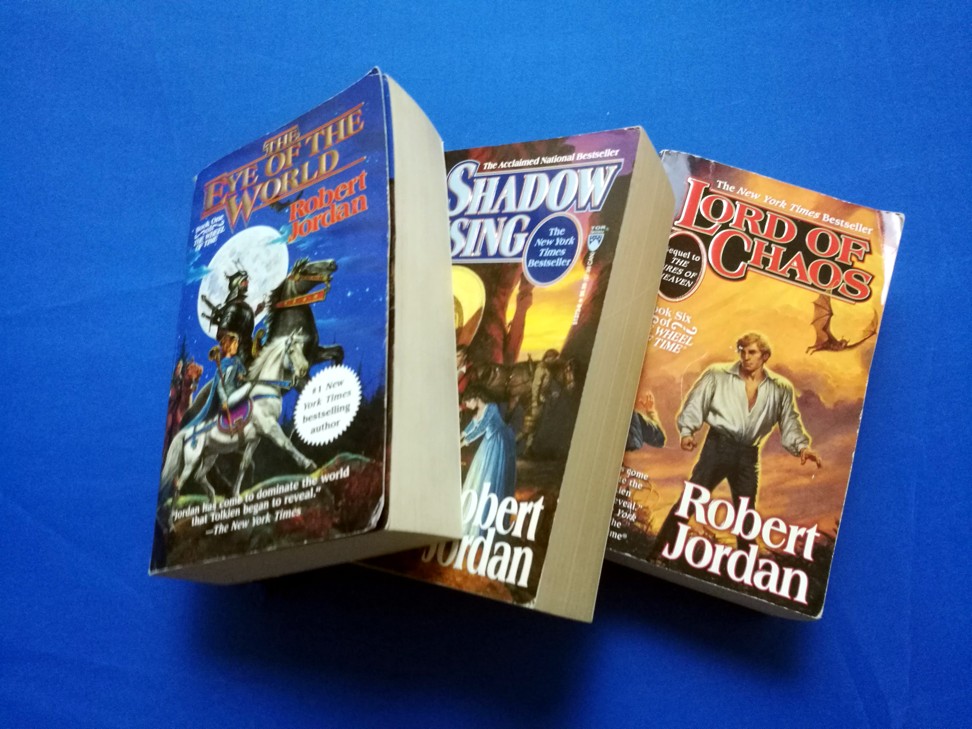 Three of the 14 Wheel of Time books.