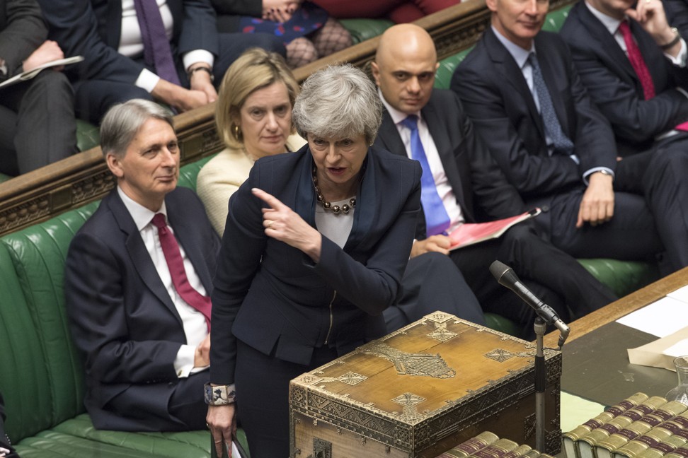 British Prime Minister Theresa May speaks during Prime Ministers Questionsin the British House of Commons on Wednesday. Photo: EPA