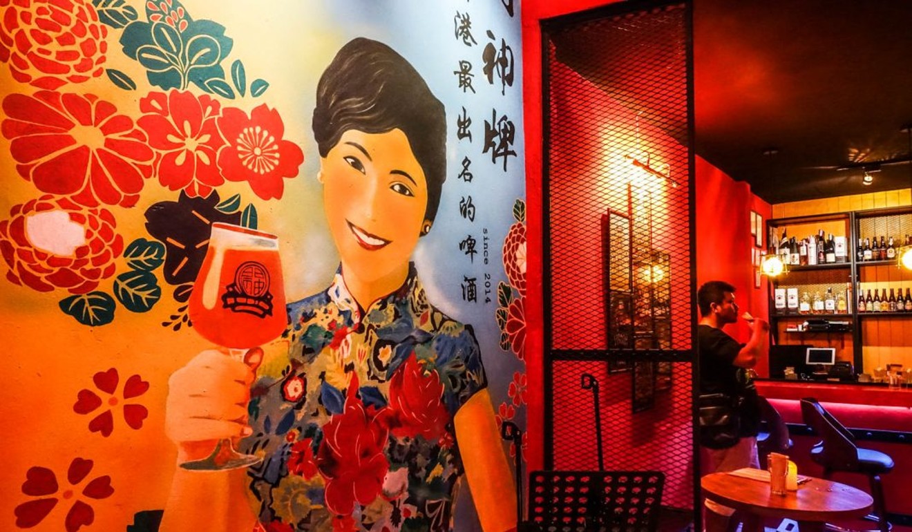 A mural of the wife of Akarawat's owner with a glass of Moonzen.
