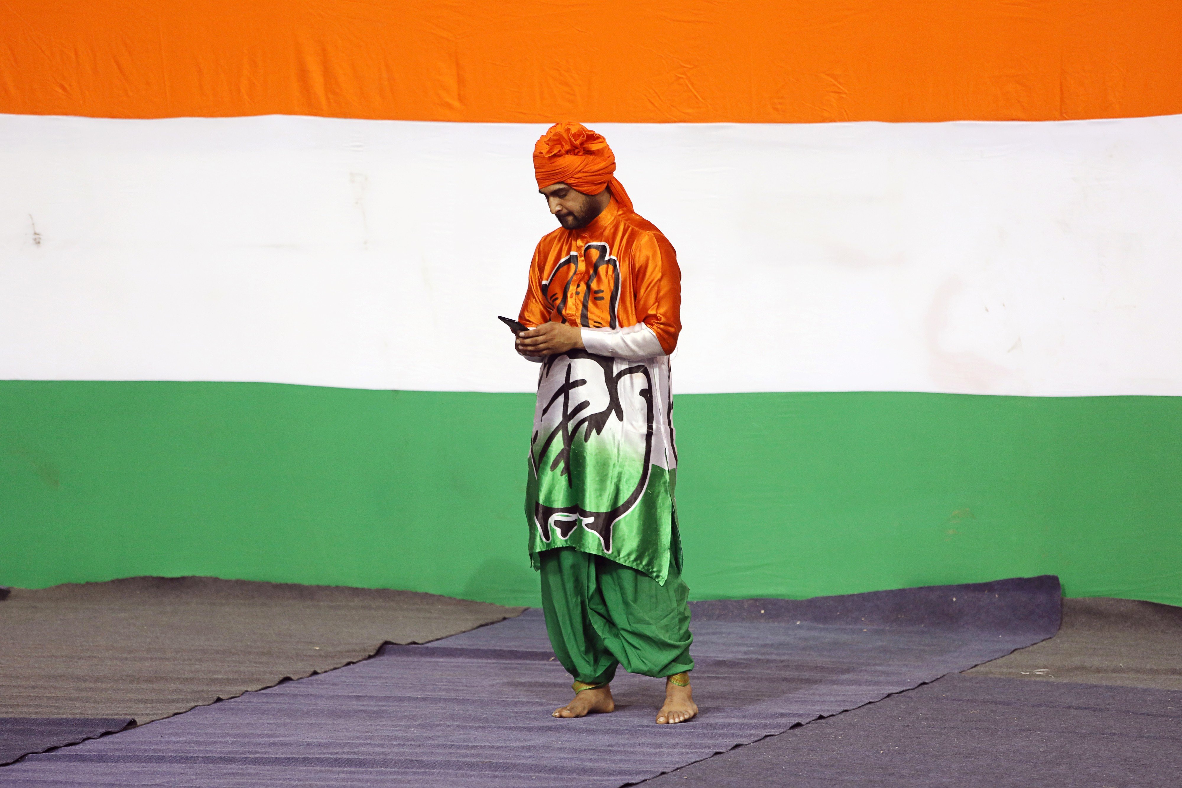 Looking down? A supporter of the Indian National Congress party. Photo: Bloomberg