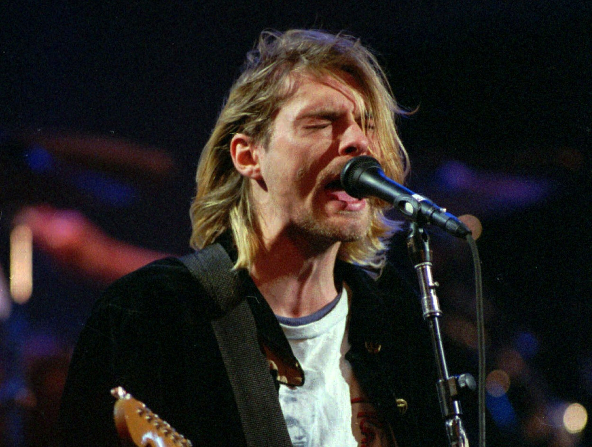 Kurt Cobain's iconic cigarette-burned sweater sells for