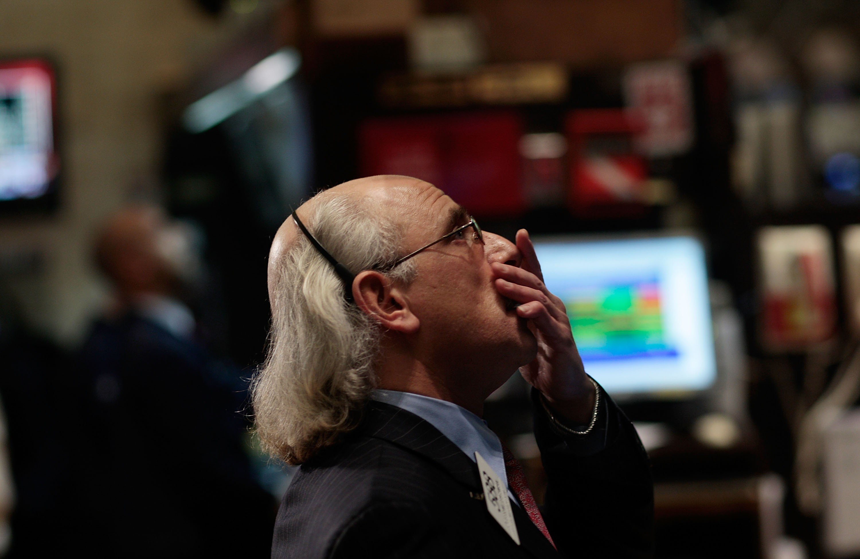 A financial professional reacts to market volatility on the floor of the New York Stock Exchange on March 6, 2009. Photo: AFP