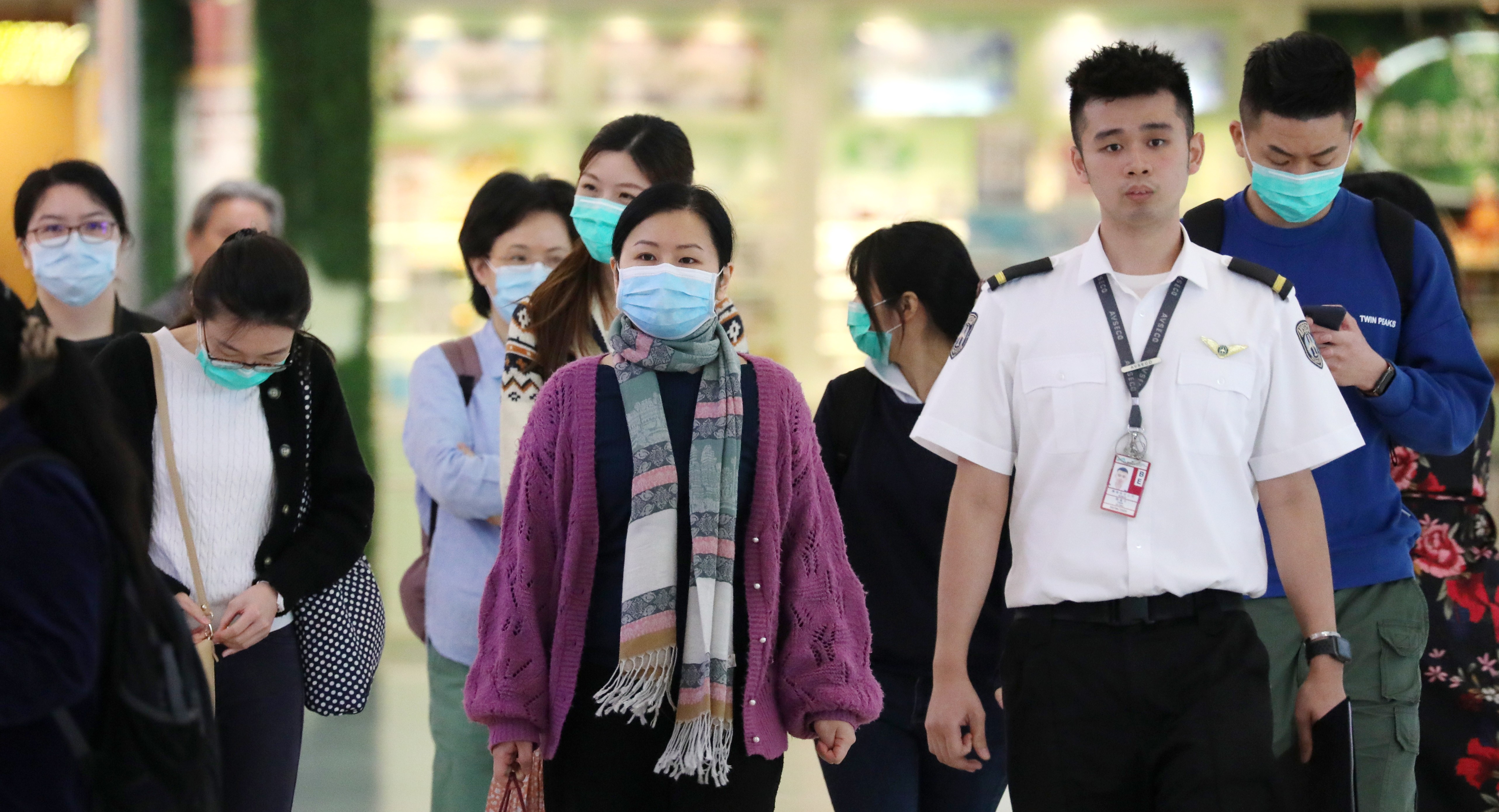 People at Hong Kong International Airport wearing masks. Photo: Felix Wong