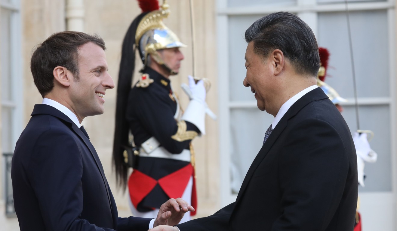 French President Emmanuel Macron welcomes Chinese President Xi Jinping to the Elysee Palace in Paris last month. Photo: AFP