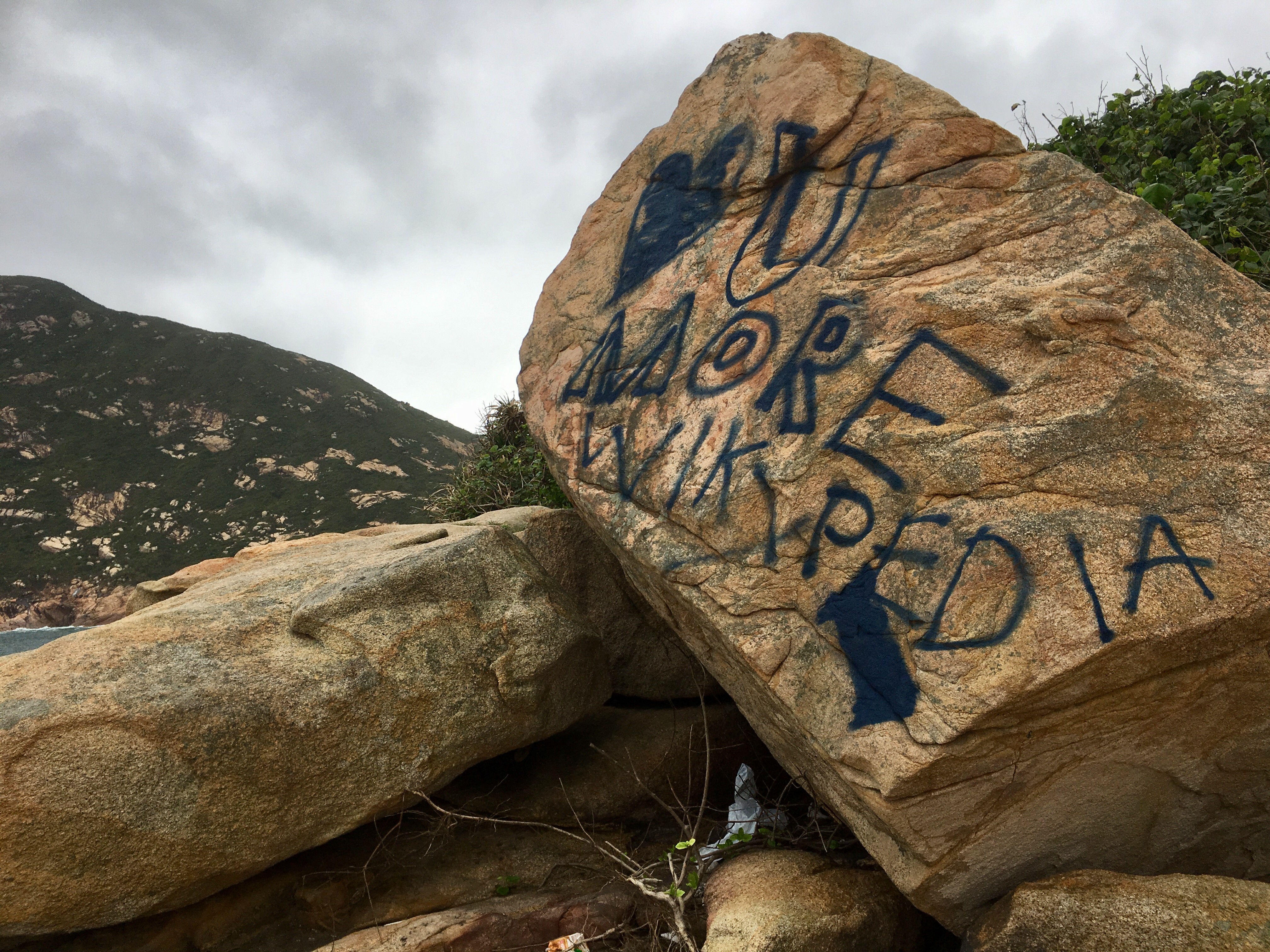 Some of the graffiti sprayed on Shek O’s rocks doesn’t even make sense. Photo: Kylie Knott