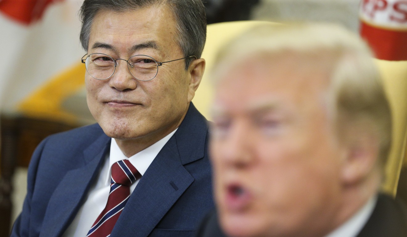 US President Donald Trump speaks as South Korean President Moon Jae-in listens during a meeting in the Oval Office of the White House in May 2018. Photo: EPA