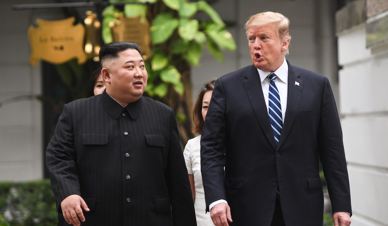 US President Donald Trump walks with North Korea leader Kim Jong-un during a break in talks at the second US-North Korea summit at the Sofitel Legend Metropole hotel in Hanoi. Photo: AFP
