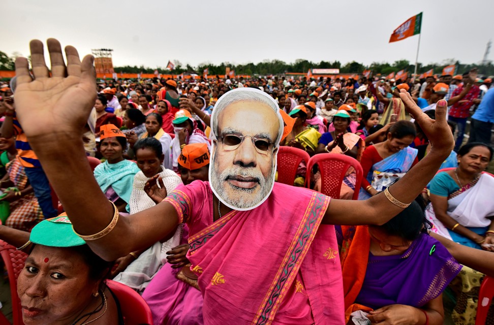 A Modi supporter at a BJP election rally in Assam, India. Photo: Reuters