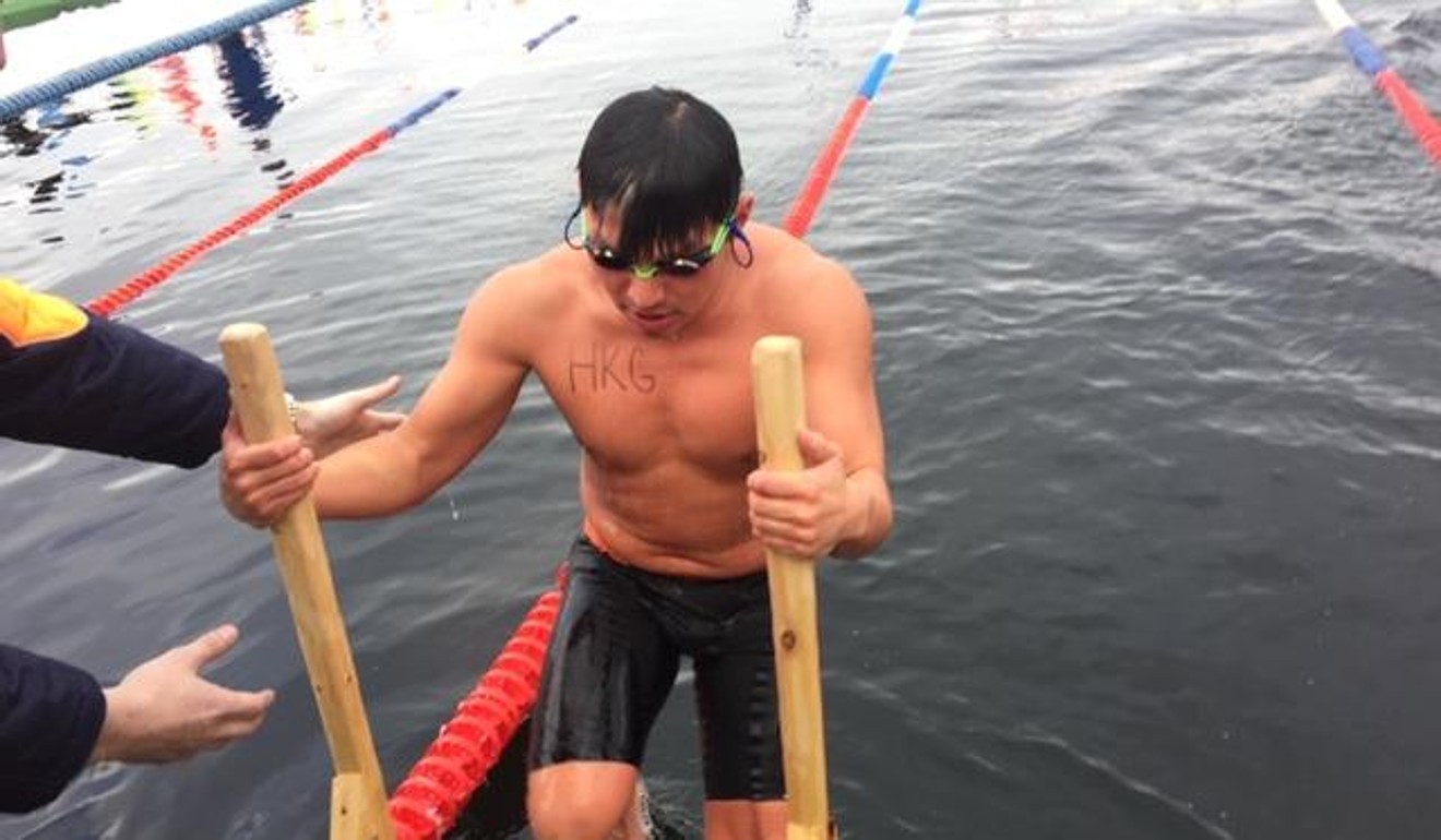 Mak Chun-kong getting out of the water in Russia. He lost his swimming cap during one race which can be deadly. Photo: Handout