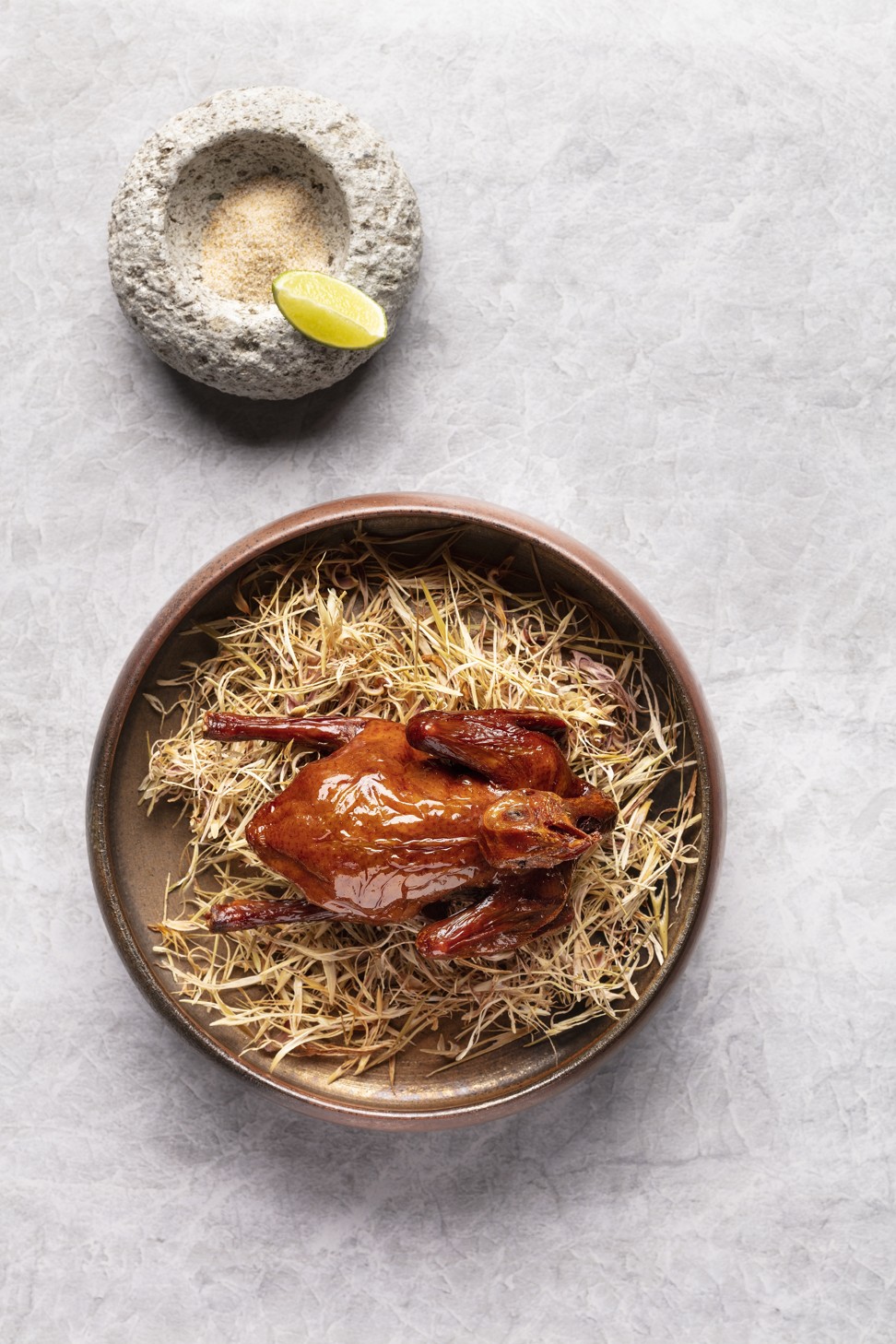 Oven-roasted baby pigeon with lemongrass