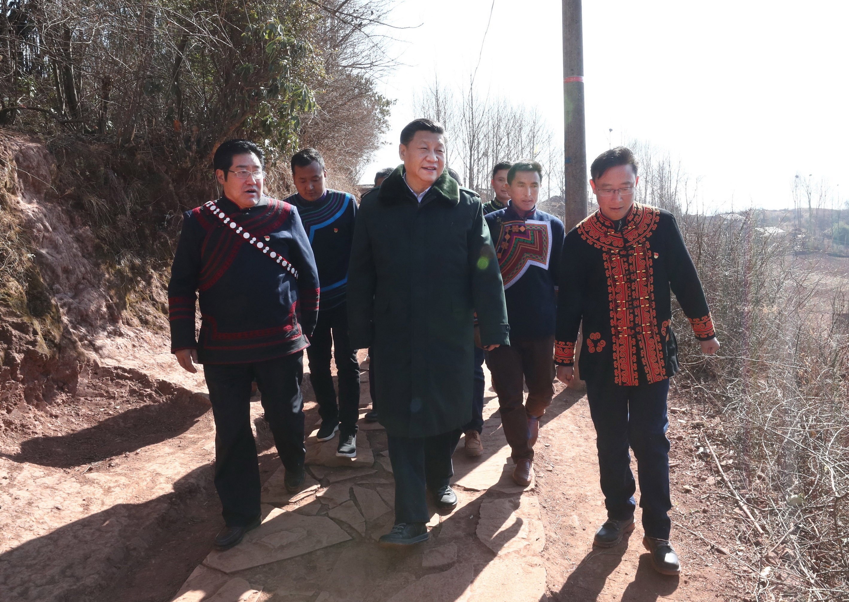 Chinese President Xi Jinping learns about the lives of impoverished villagers and the work on targeted poverty alleviation in Sanhe Village, in Liangshan Yi Autonomous Prefecture, Sichuan province, in February 2018. Photo: Xinhua