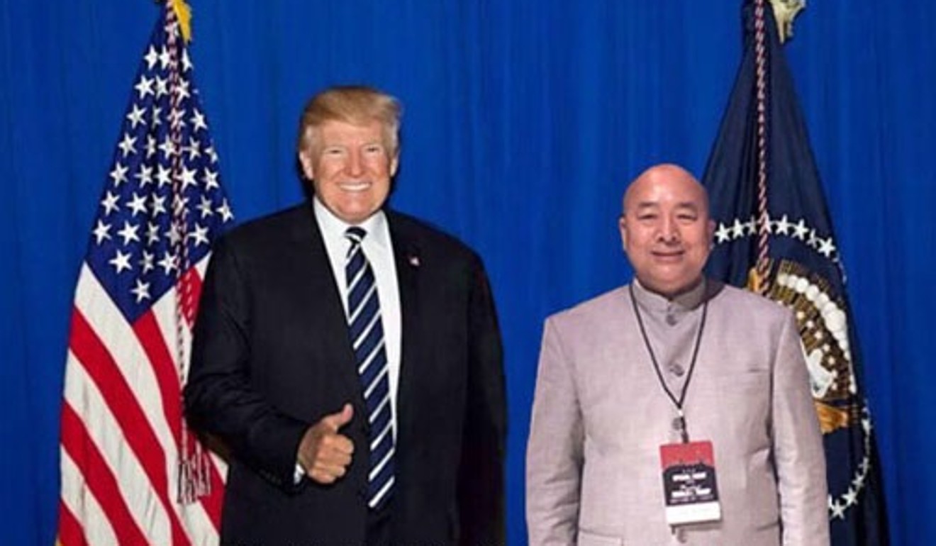 A photo from Charles Lee’s defunct website that claims to show Lee with US President Donald Trump.