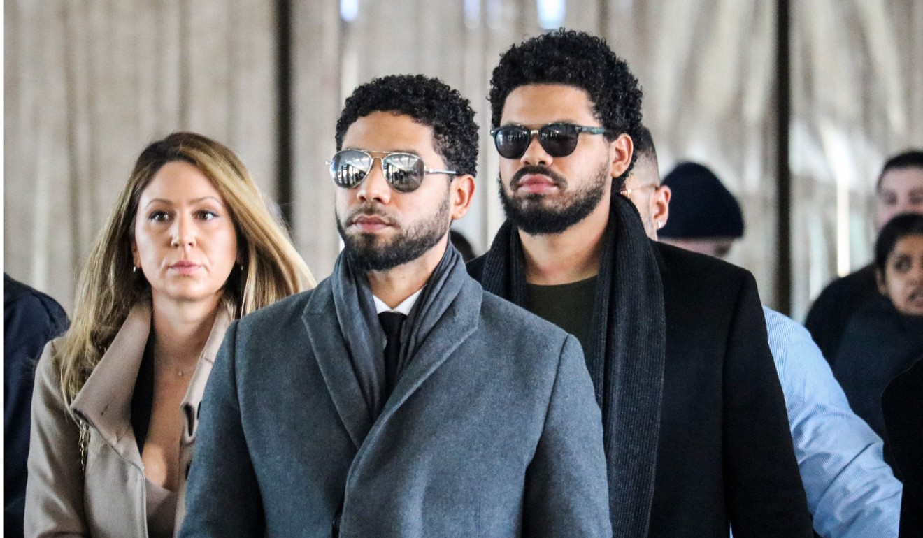 Jussie Smollett and his team arrive for a court hearing Courthouse in Chicago on March 12, 2019. Photo: AFP