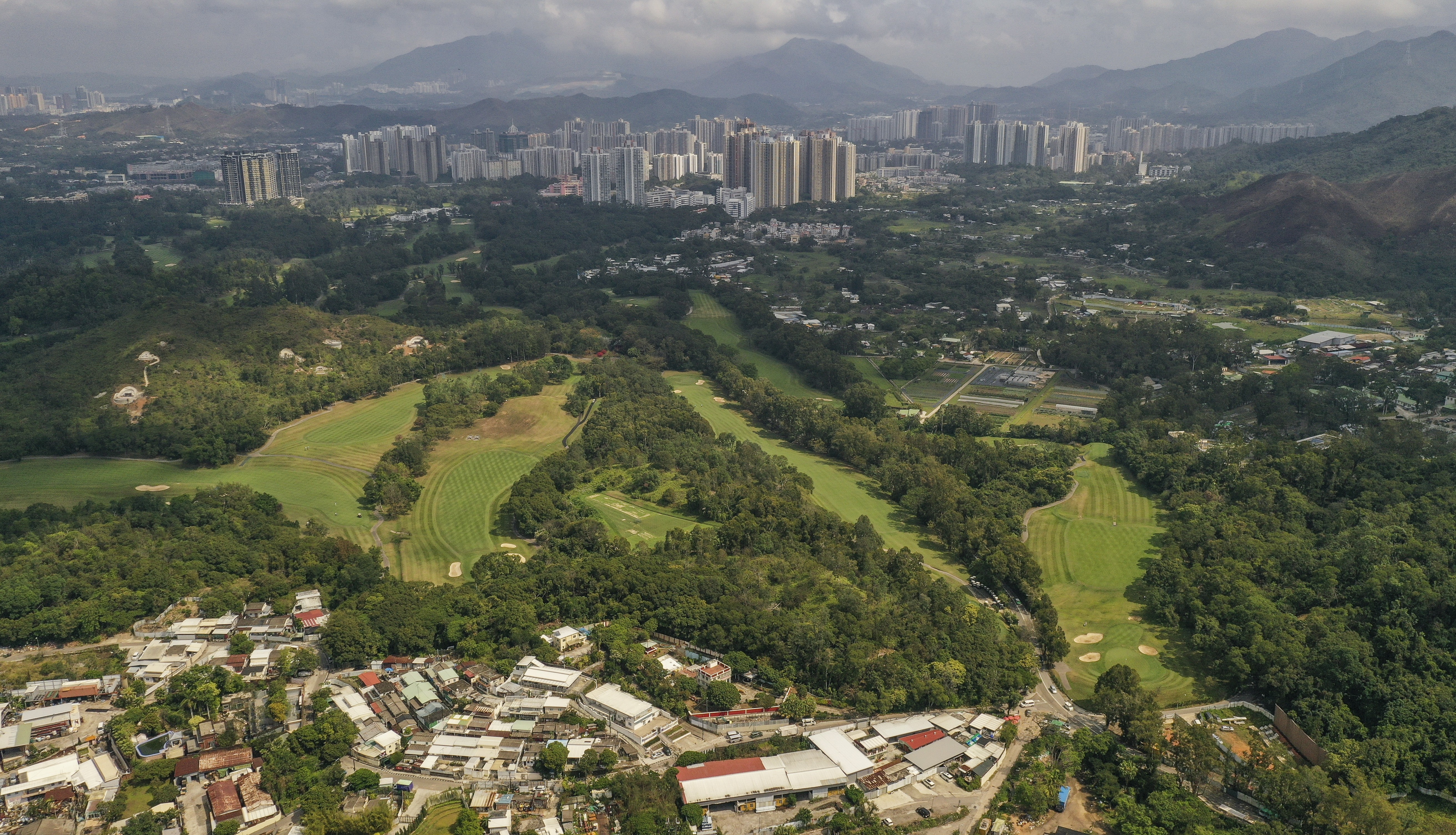 An aerial view of the Hong Kong Golf Club in Fanling shows a brownfield site in the foreground. Proposals from the Task Force on Land Supply accepted by the government include using a fifth of the 172-hectare golf course in Fanling for housing. Photo: Winson Wong