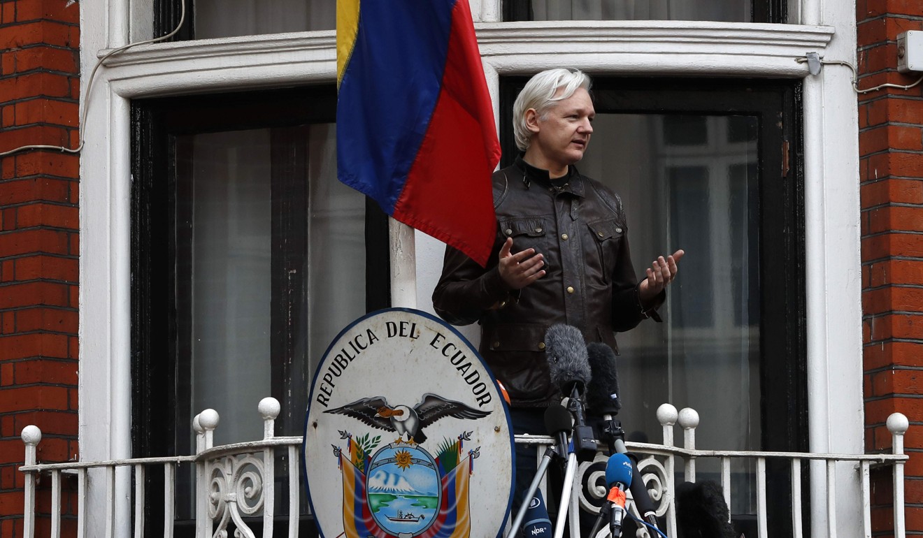 A file photo of Julian Assange speaking from a balcony at Ecuador’s embassy in London in May 2017. Photo: AFP