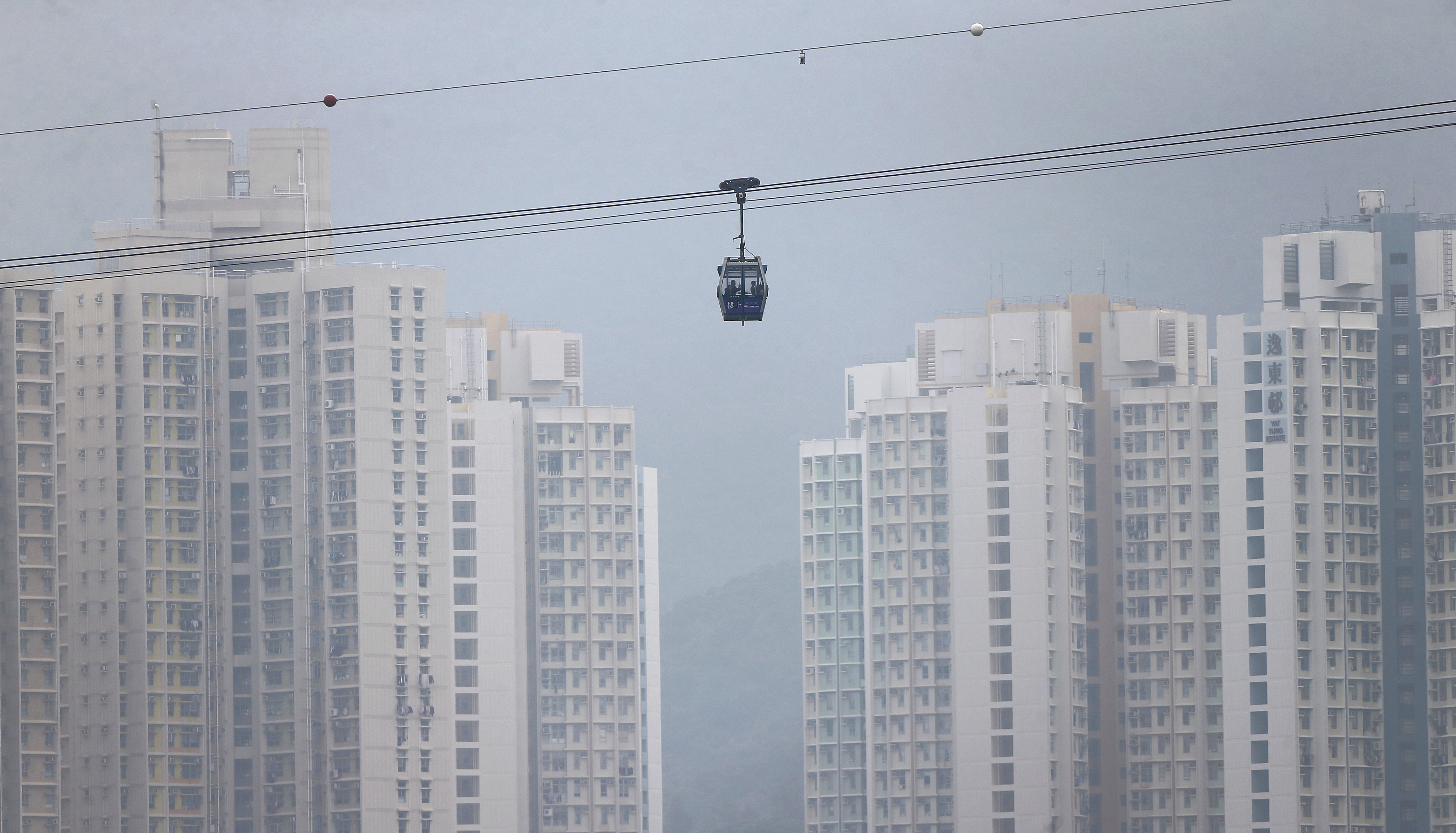 The Ngong Ping 360 cable car service will resume when the weather improves. Photo: Sam Tsang