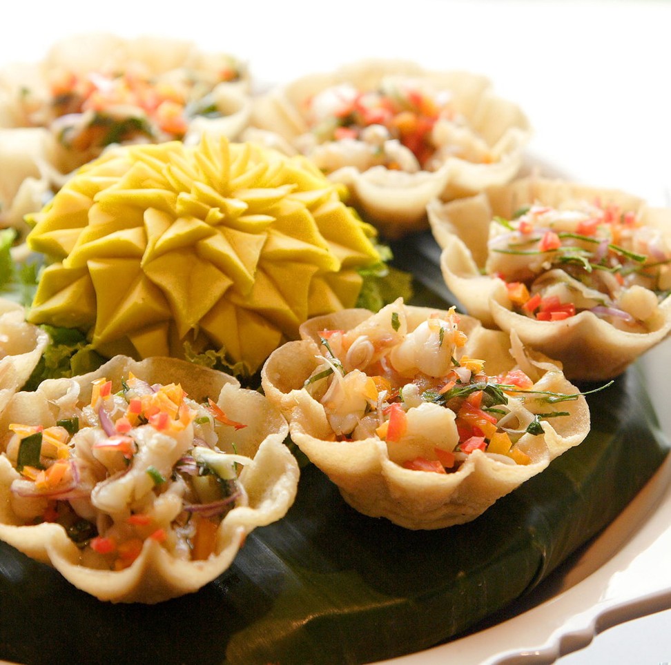 Ruen Urai serves royal Thai cuisine, featuring dishes like crispy cups filled with prawn and herb salad.