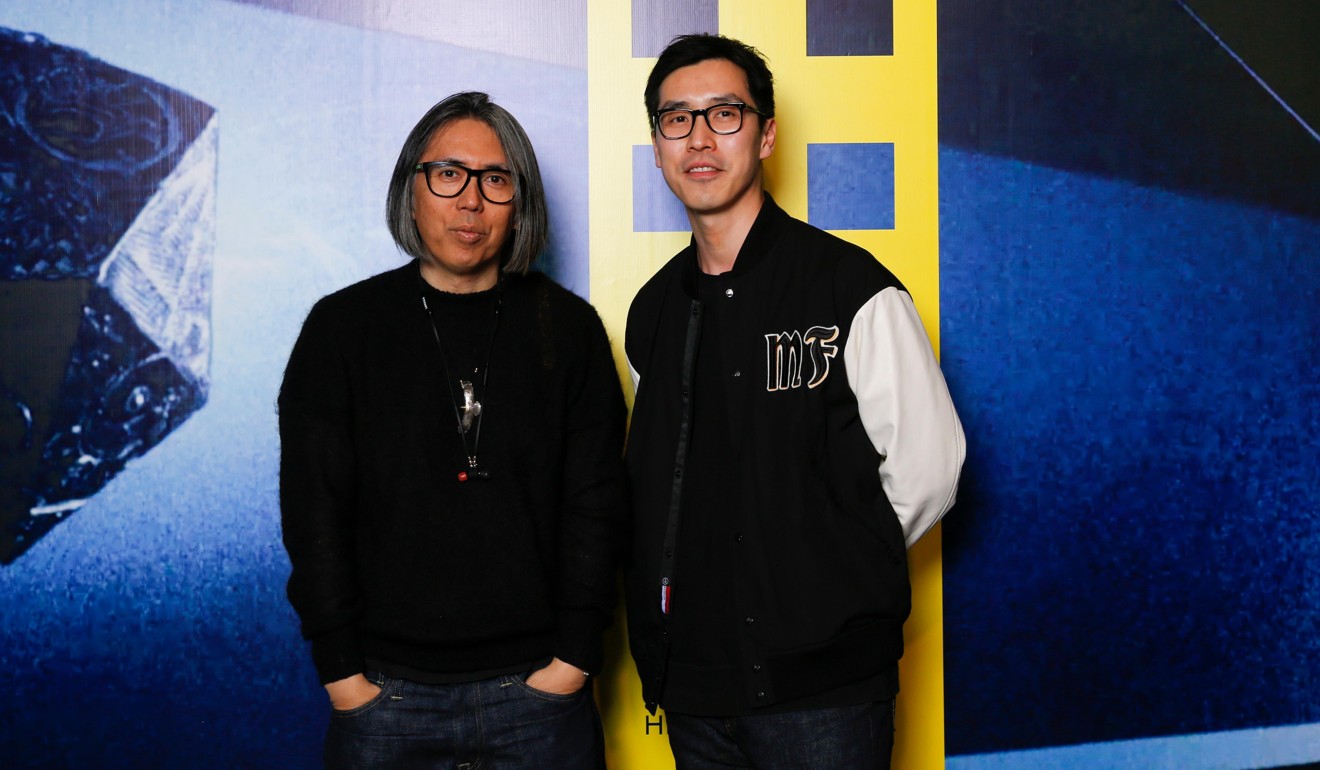 Fujiwara (left) and Kevin Ma, founder of online platform Hypebeast, at Art Basel Hong Kong.