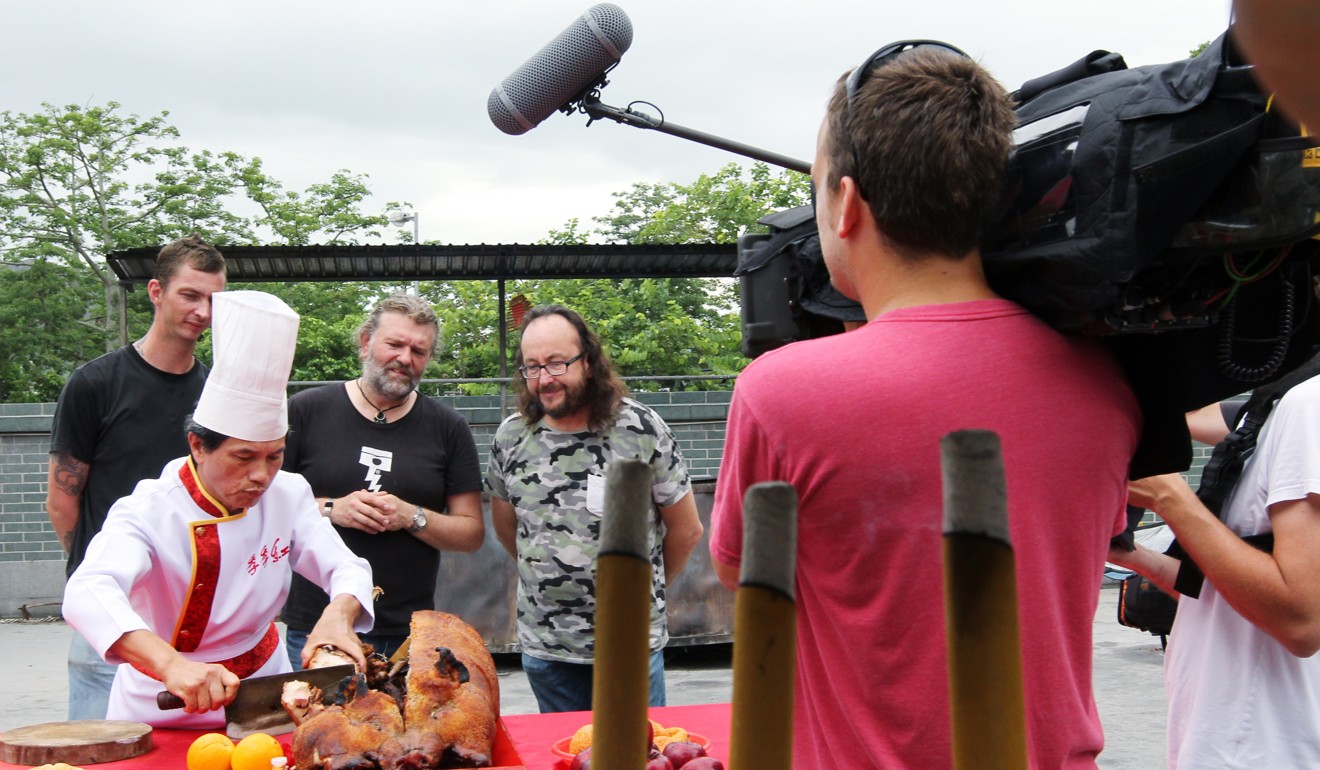 British celebrity TV chefs The Hairy Bikers attending a traditional roast pig cutting ceremony at a Tin Hau Temple in Yuen Long in June 2013. Photo: Nora Tam