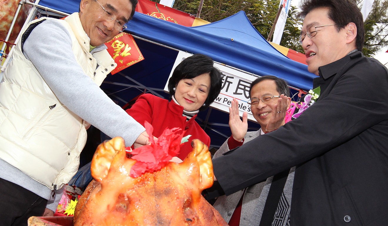 Left to right: Lawmakers Michael Tien, Regina Ip and Jasper Tsang and deputy chairman of the New People Party Louis Shih at the party’s Lunar New Year fair booth at Victoria Park Fair in January 2011. Photos: Felix Wong