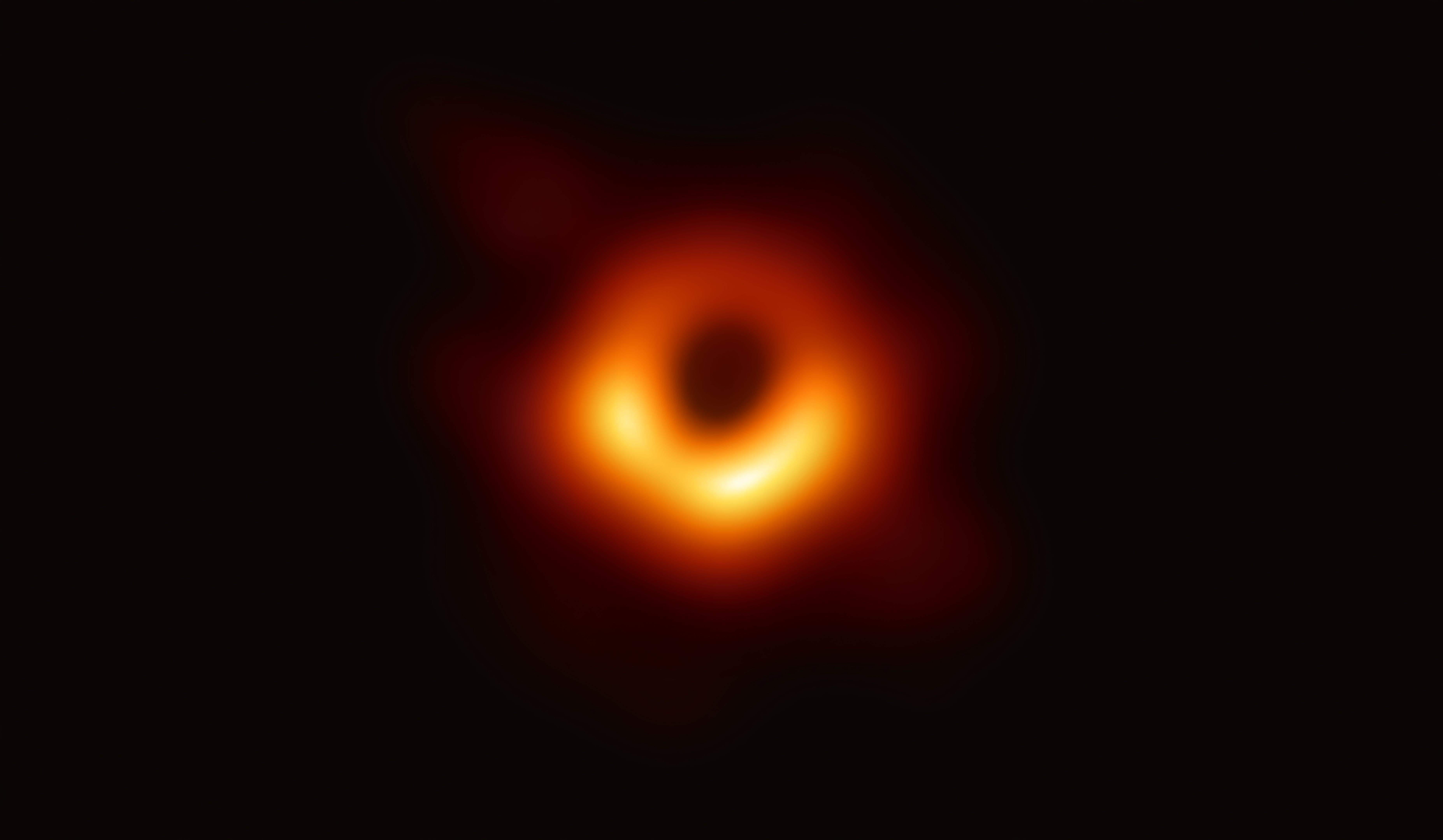 A handout photo provided by the European Southern Observatory shows the first photograph of the black hole at the centre of Messier 87, a massive galaxy in the nearby Virgo galaxy cluster. Photo: AFP