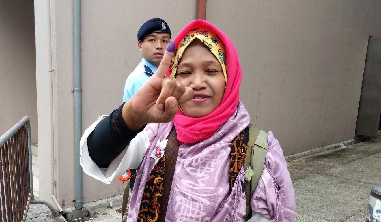 Indonesian domestic worker Kamidiyah Sadikin was among the first to cast her vote on Sunday morning. Photo: Sum Lok-kei