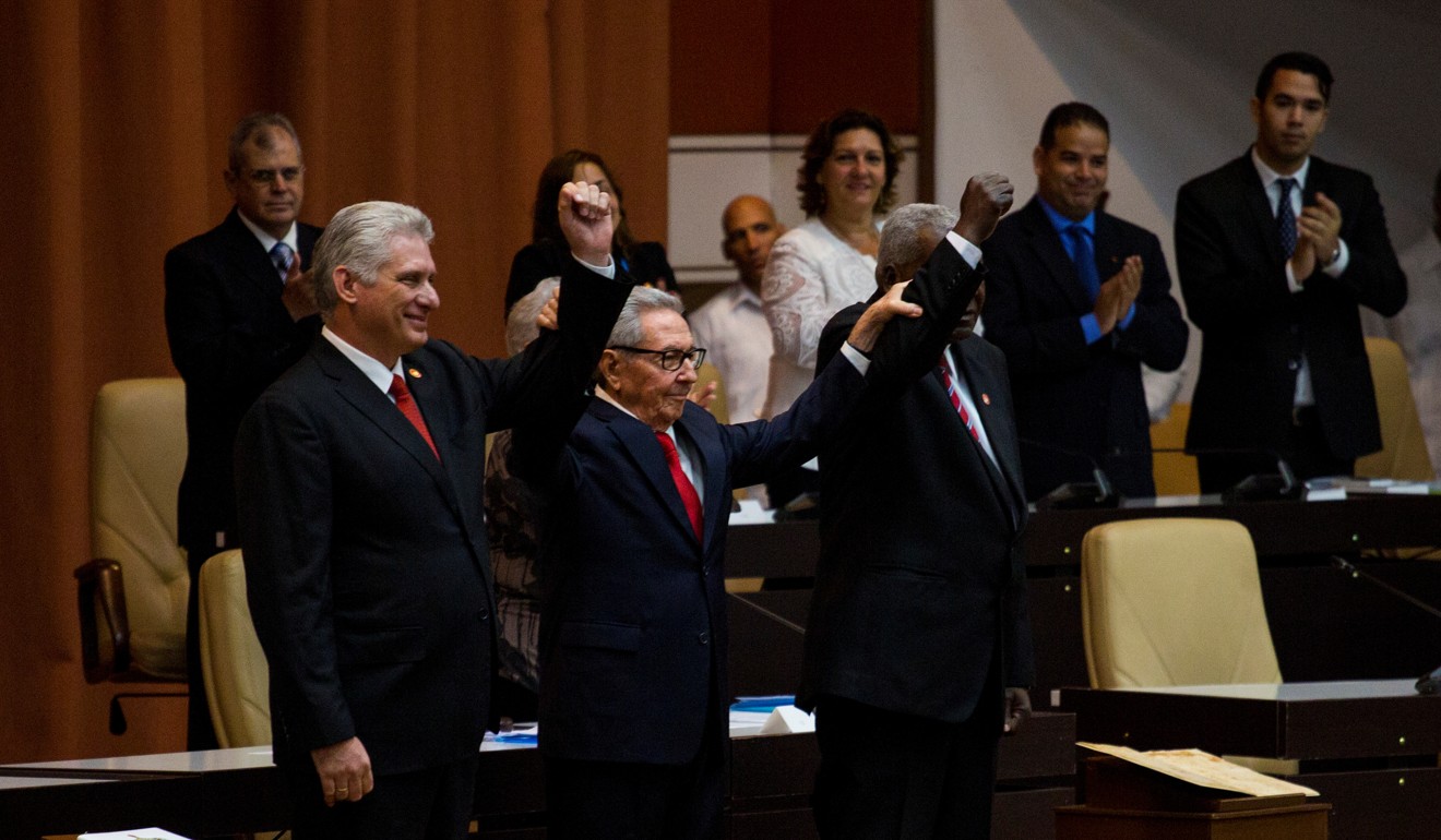 (Left to right) Cuban President Miguel Diaz-Canel, Cuban Communist Party leader Raul Castro and National Assembly President Esteban Lazo react during the enactment of the new constitution in Havana, Cuba, on Wednesday. Photo: Cubadebate handout via Reuters