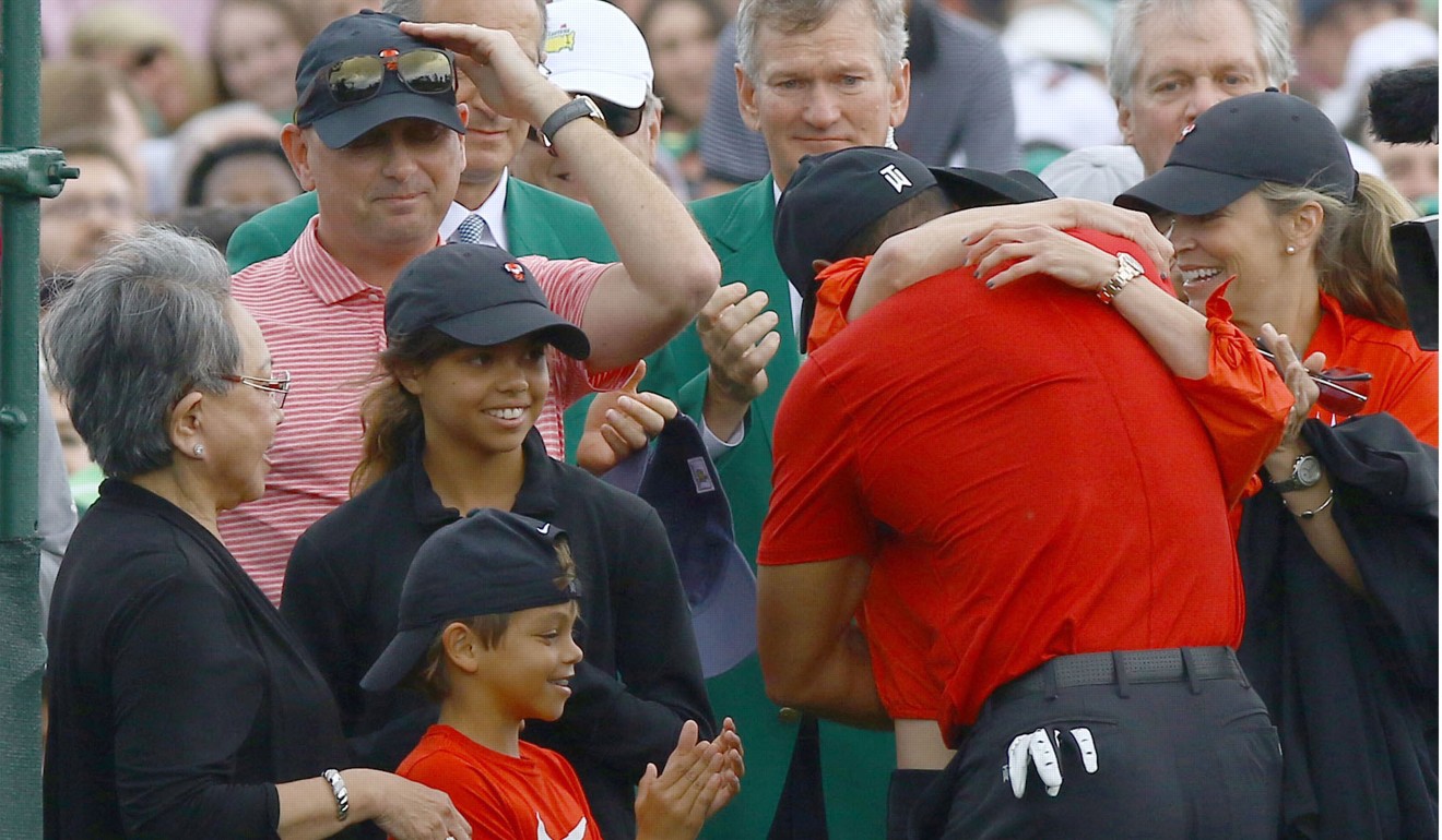 Tiger Woods celebrates with his family following his Masters win. Photo: Kyodo