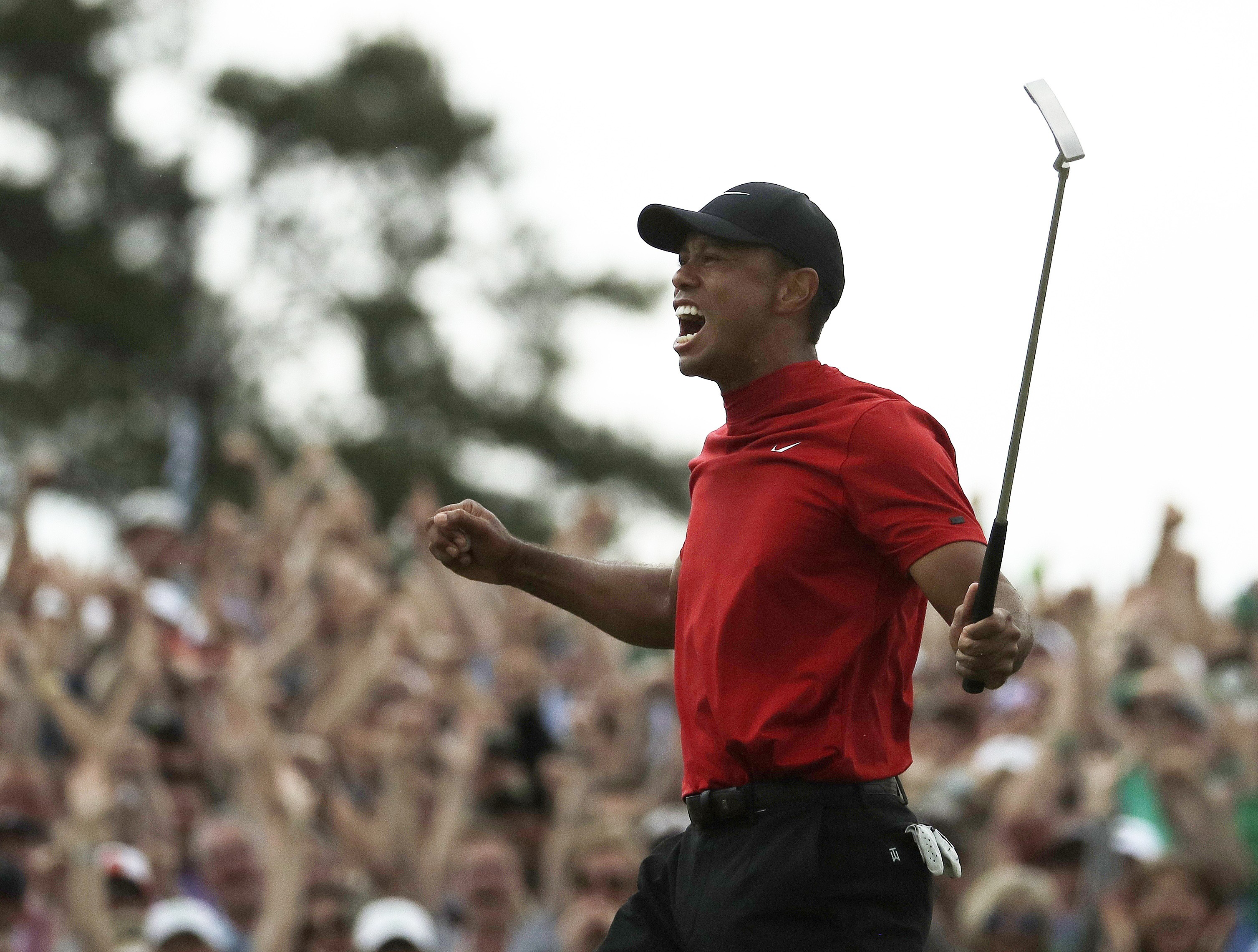 Tiger Woods reacts as he wins the Masters golf tournament Sunday, April 14. Photo: AP Photo