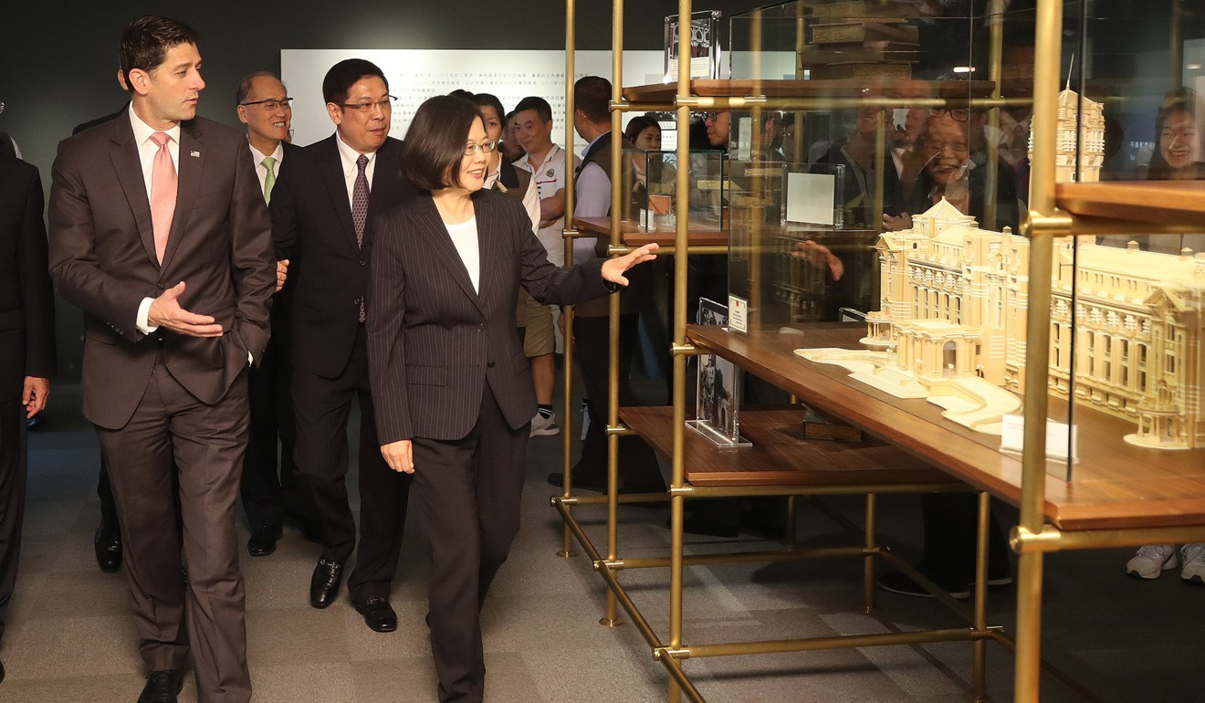 Taiwan President Tsai Ing-wen and Paul Ryan at an exhibition dedicated to the island’s Presidential Building. Photo: CNA