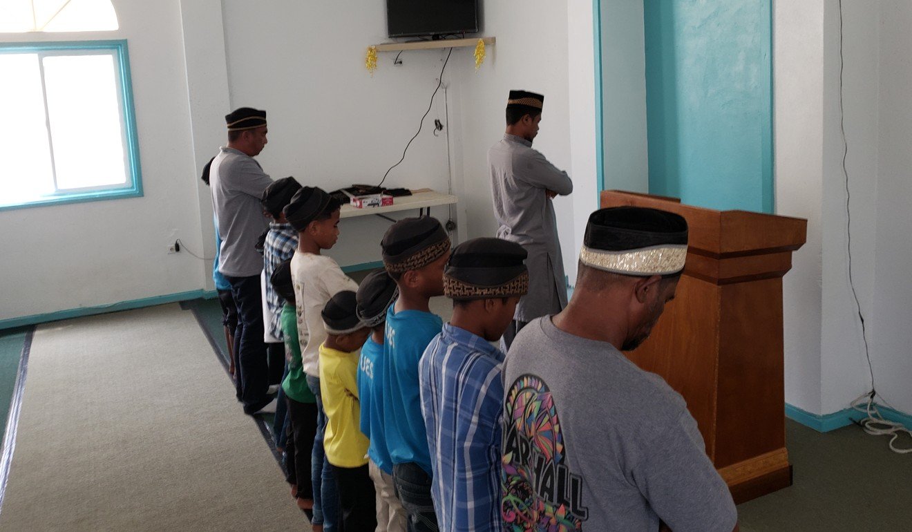 A prayer service at the Ahmadi mosque in the Marshall Islands. Photo: Sajid Iqbal