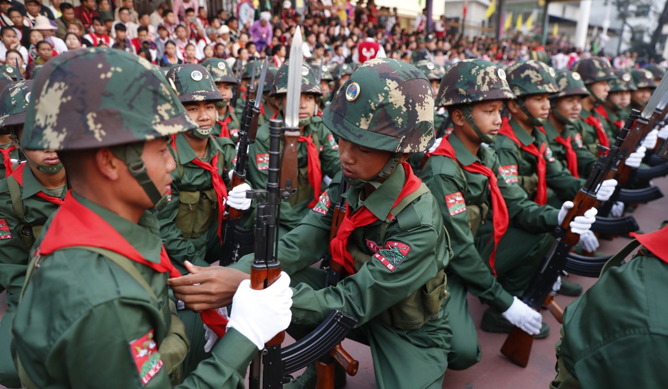 UWSA soldiers prepare for a parade held to mark the 30th anniversary of Wa State in Panghsang. Photo: EPA-EFE