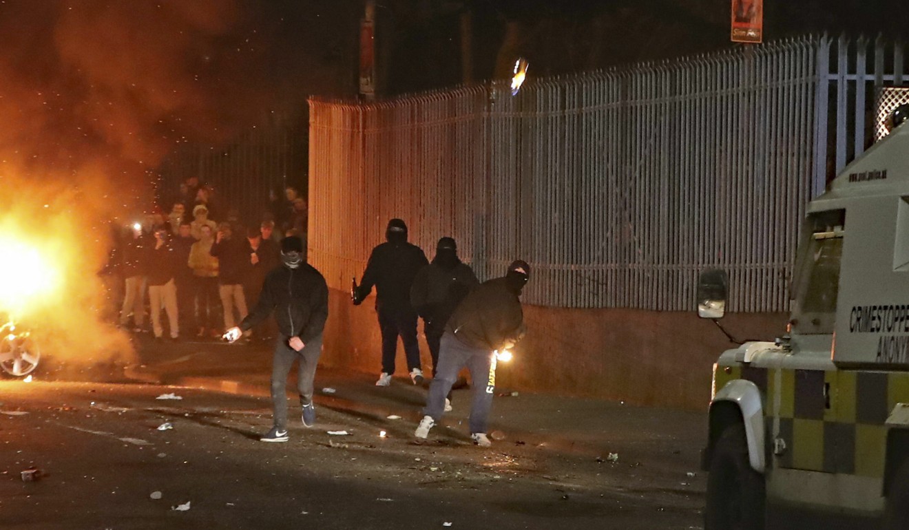 Petrol bombs are thrown at police in Creggan, Londonderry, in Northern Ireland on April 18, 2019. Photo: AP