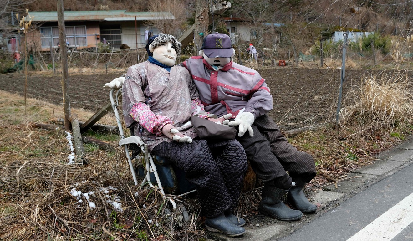 Life-size dolls sitting by a roadside in the tiny village of Nagoro in western Japan. Photo: AFP