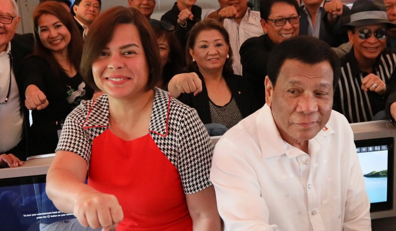 Davao Mayor Sara Duterte-Carpio and her father President Rodrigo Duterte. Photo: EPA-EFE