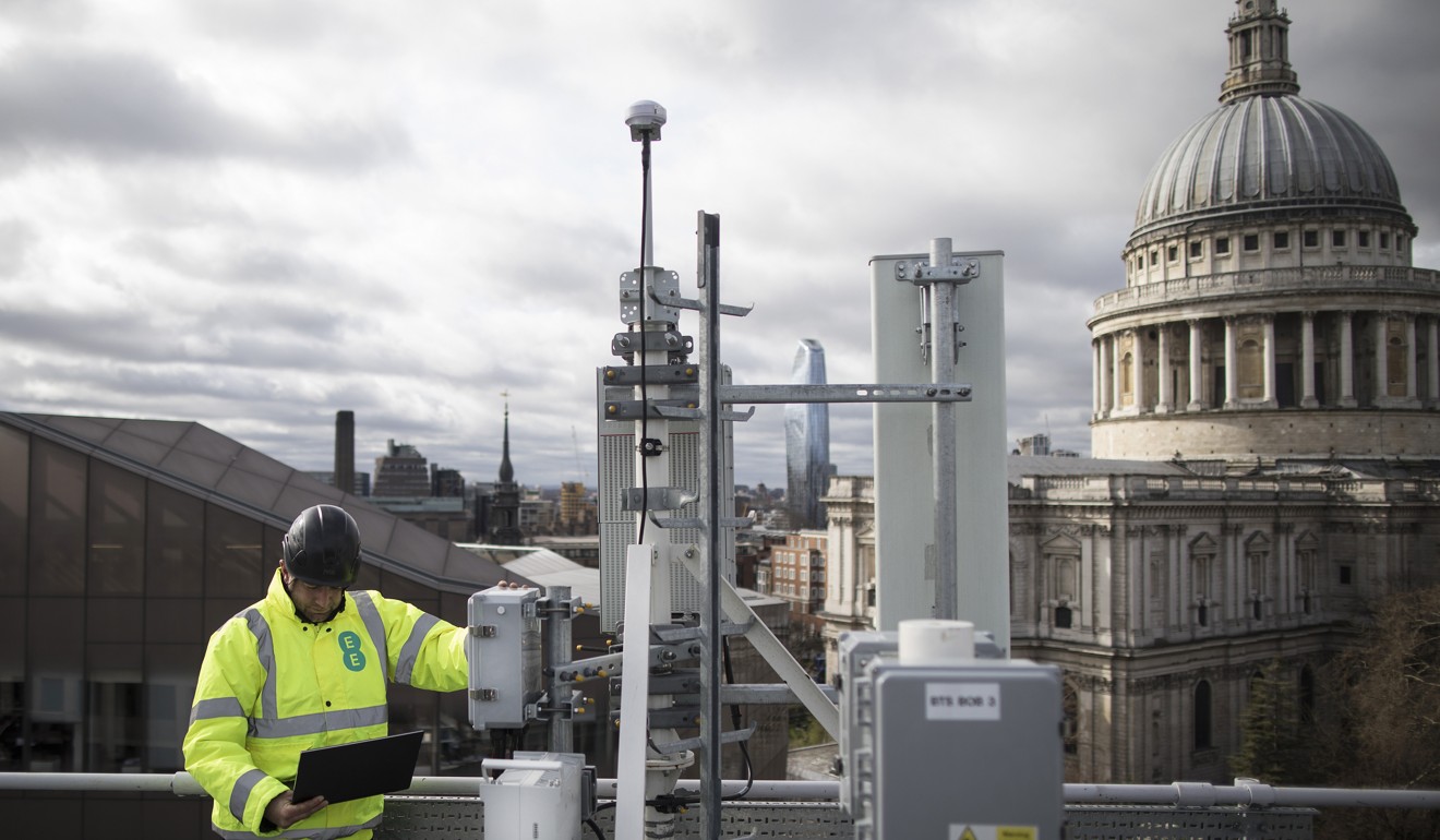An engineer checks 5G masts and Huawei equipment during trials in the City of London. Photo: Bloomberg