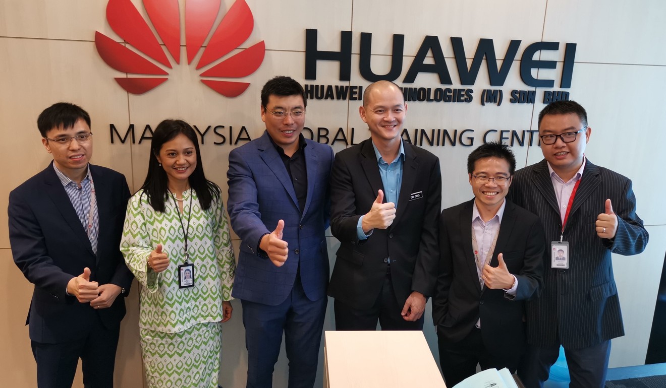 Thumbs up: Malaysia’s Deputy Minister of International Trade and Industry Ong Kian Ming at the Huawei press conference