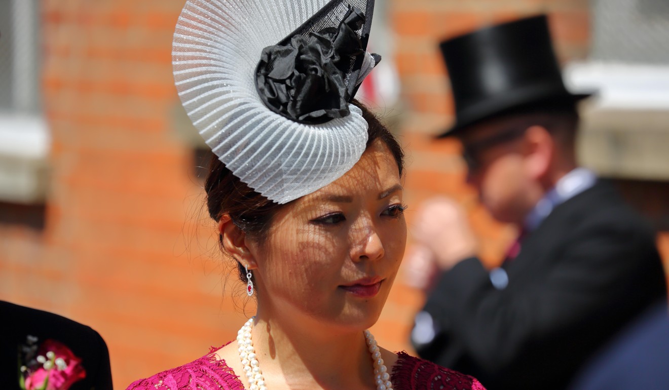 Chinese women are generally quite petite, so should avoid a hat that swamps the wearer at Royal Ascot. Photo: Alamy