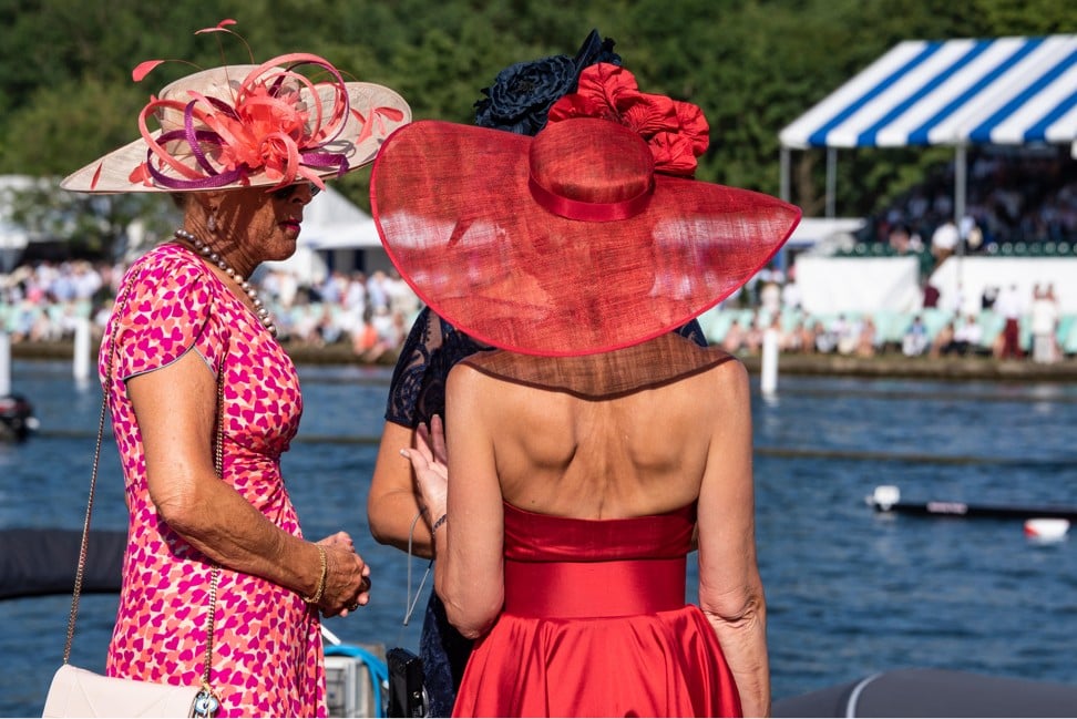 Ladies attend Henley Regatta at the Phyllis Court Club, Henley on Thames, Oxfordshire, the UK. Photo: Alamy