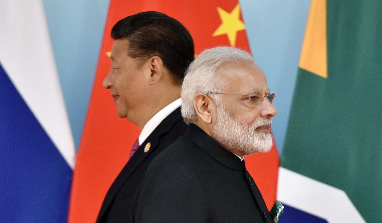 A summit between Xi Jinping (left) and Narendra Modi in Wuhan last year was seen as a breakthrough in China-India relations after the Doklam border dispute. Photo: AFP