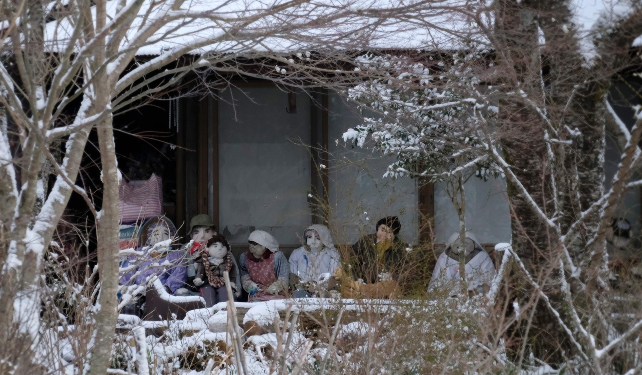 Life-size dolls on a house veranda in the tiny village of Nagoro. Photo: AFP