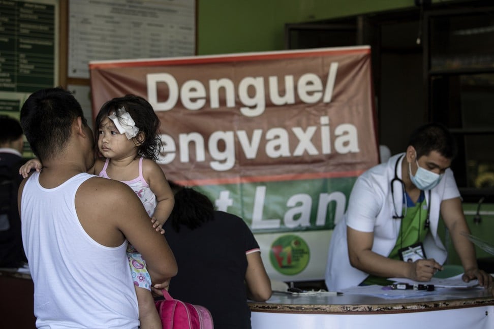 A poster at the East Avenue Medical Centre in Manila promoting Dengvaxia in March last year (the vaccine was permanently banned in the Philippines earlier this year). Photo: AFP