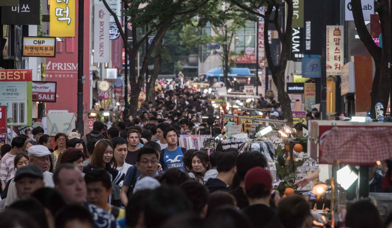South Koreans in the Myeongdong shopping area of Seoul. South Korea recorded more than 16,000 cases of HIV infection in 2017. Photo: AFP