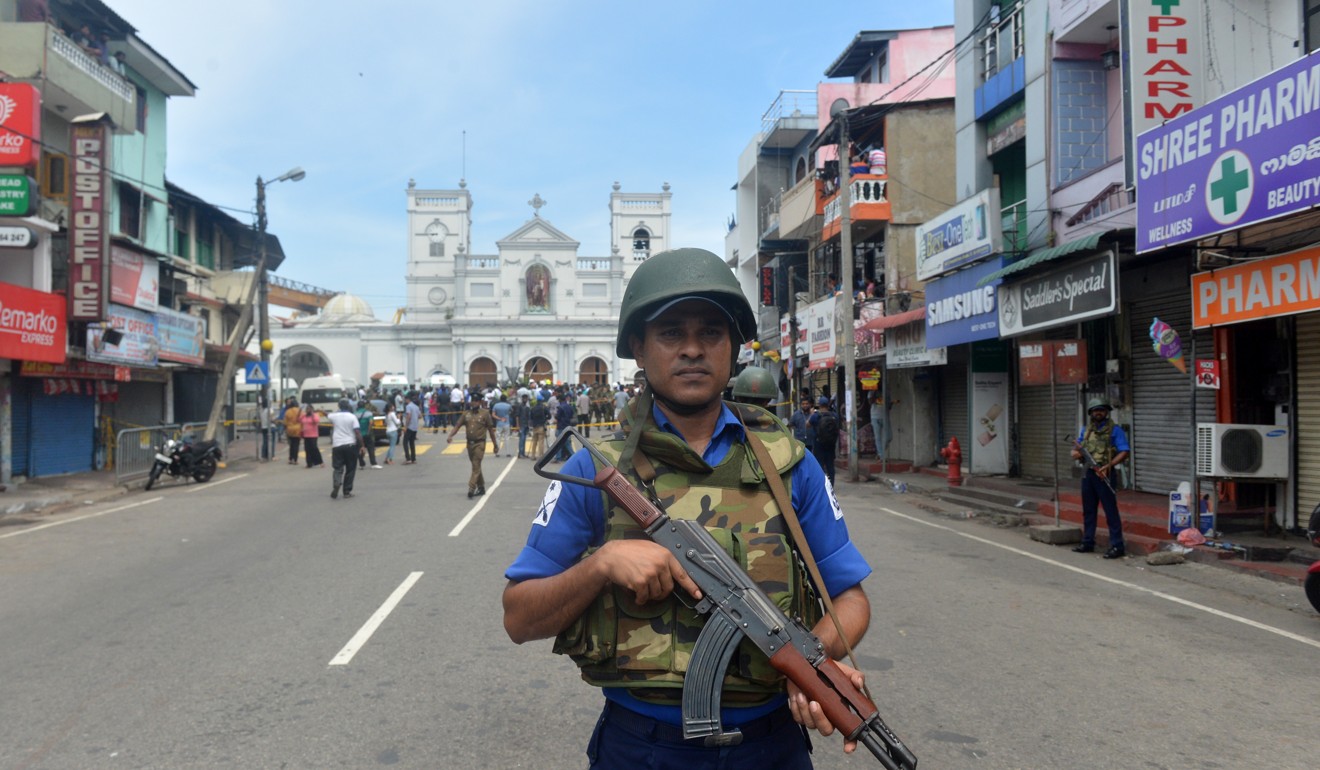 A soldier stands guard in front of the St Anthony’s Church in Colombo. Photo: Xinhua