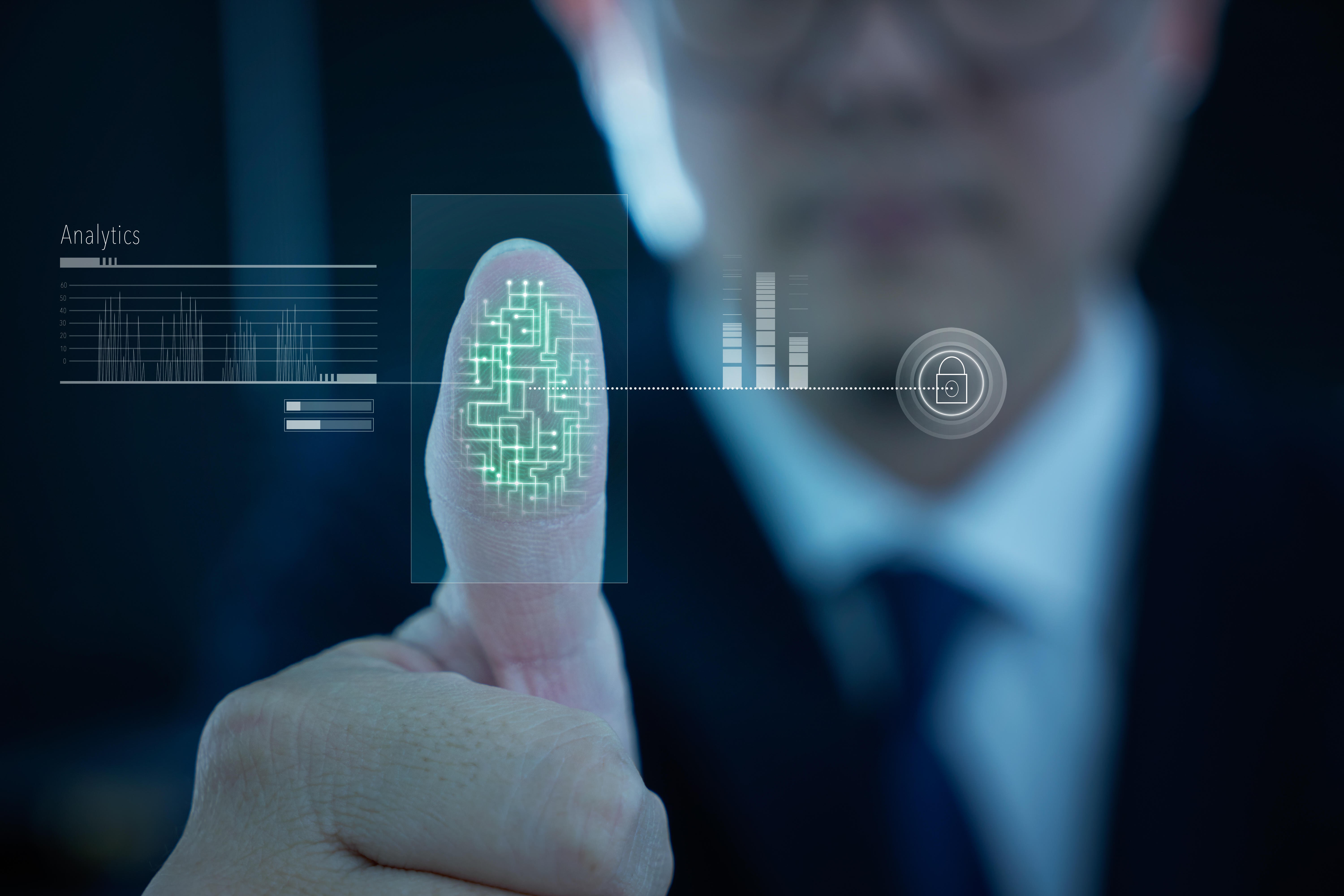 A young businessman scans fingerprint for identity analytics. Photo: Alamy