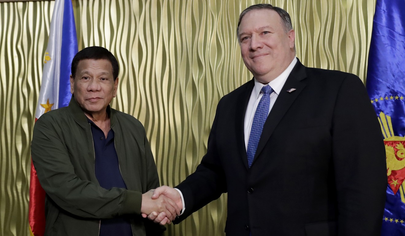 Philippine President Rodrigo Duterte (left) greets US Secretary of State Mike Pompeo at Villamor Air Base, southeast of Manila, the Philippines, on February 28. Photo: AP