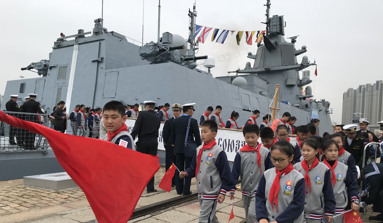 School pupils visit a Russian Admiral Gorshkov-class frigate on in Qingdao on Wednesday. Photo: Minnie Chan