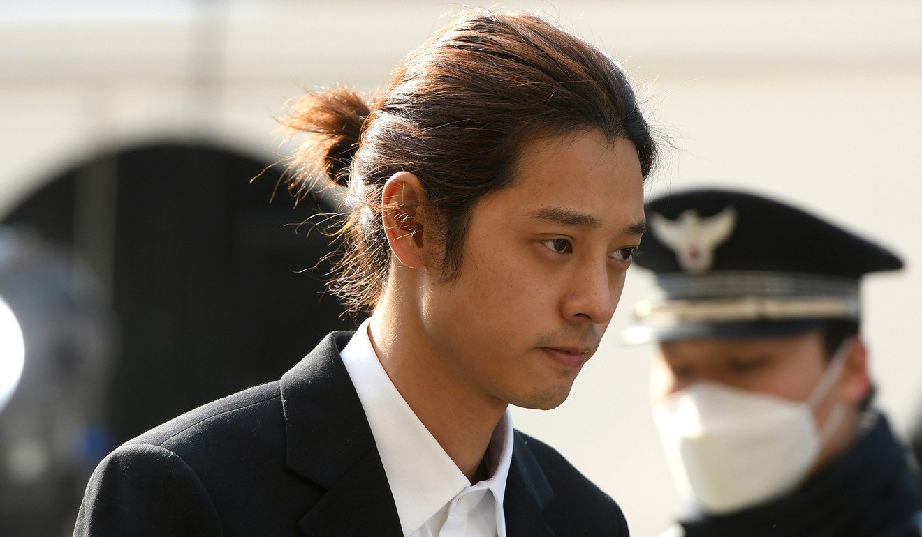 K-pop star Jung Joon-young arrives for questioning at the Seoul Metropolitan Police Agency on March 14. Photo: AFP